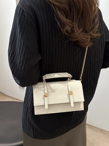 Retro cream white pleated crossbody bag with gold chain and dual buckles on shoulder