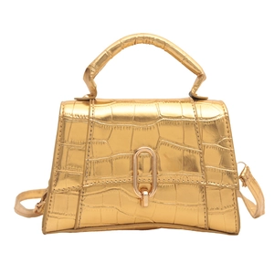Chic golden faux crocodile leather crossbody bag with metallic handle and twist lock