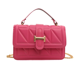 Vibrant rose pink quilted crossbody bag with golden chain strap and top handle