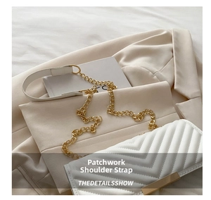 Close-up of the elegant cream-colored quilted leather bag with a gold metal clasp and chain