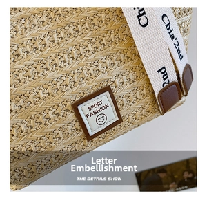 Close-up of woven straw texture with canvas strap and sport fashion logo detail