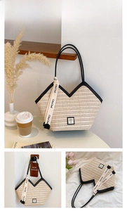 Detail of straw woven tote bag featuring black PU trim and V-shaped cut with stylish straps
