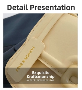 Detail of beige leather handbag featuring Fashion & Bags engraving and precise stitching