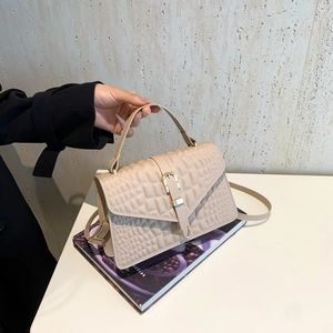 Chic beige crocodile pattern flap handbag with gold buckle and top handle for women