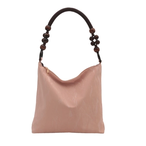 Pink hobo shoulder bag with unique dark wood bead handles and gold zipper on white background