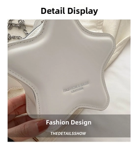 Detailed view of a white star-shaped crossbody bag with embossed logo and silver chain
