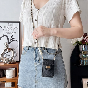 Quilted black leather crossbody phone bag with white pearl and gold chain strap