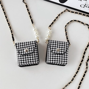 Detail of houndstooth case with pearl chain strap and metal buckle for Samsung Z Flip