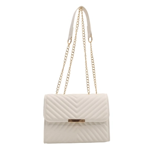 White quilted crossbody bag with gold hardware and chain strap for women