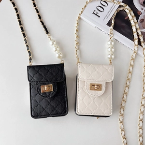 Quilted leather mini phone case bag with pearl chain strap in black and beige tones