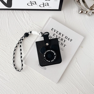 Litchi pattern leather camera shape bag with a black and white checkered strap detail
