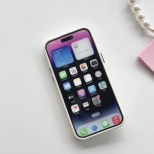 Detail of white iPhone silicone case with a pearl chain on a clean white background