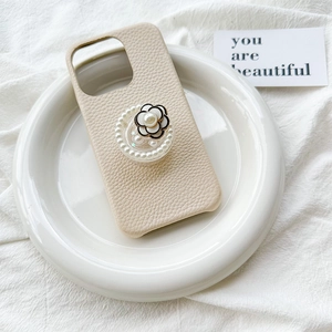 Chic cream leather phone case with camellia flower and pearl expanding grip stand