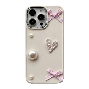 Creamy silicone iPhone case with pink bows, pearls, and heart charm in sweet 3D style