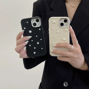 Elegant iPhone case with pearl decorations and silver metal camera protection