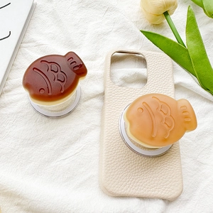 Matte fish phone grip on beige lychee leather case with tulips and home decor