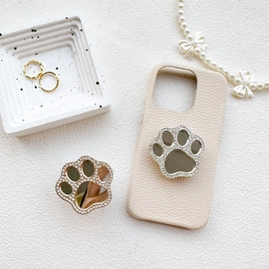Rhinestone cat paw phone grip mirror on beige leather case with luxury accessories