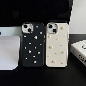 Detail of luxury silicone phone case featuring elegant pearl accents on matte surface