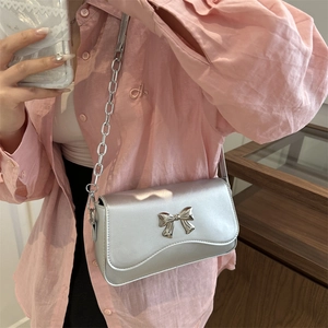 Silver metallic butterfly flap bag with elegant chain strap for women's daily fashion