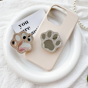 Rhinestone cat paw mirror phone grip on beige leather case with sparkling crystal details