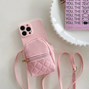 Pink quilted mini backpack phone case with adjustable strap for crossbody wear