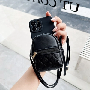 Black leather crossbody phone case featuring a mini backpack coin purse and strap