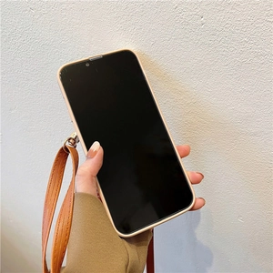 Coque iPhone bandoulière avec cordon en cuir et porte-monnaie en beige et orange