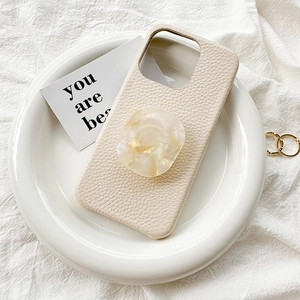 Coque en cuir beige avec support de téléphone rétractable au design marbre brillant