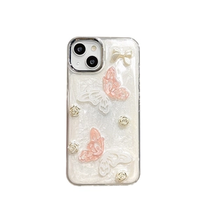 Coque iPhone rose avec papillons 3D et nœuds floraux effet perle élégant