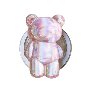 Iridescent pink teddy bear phone griptok with holographic laser finish on white background