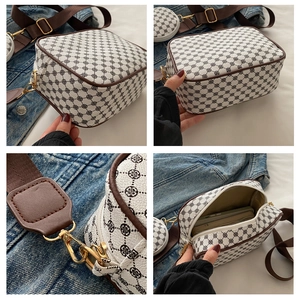 Detail of vintage floral small square bag with wide shoulder strap and round coin purse
