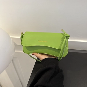 Chic light green rectangle underarm bag with rope shoulder strap and gold lettering