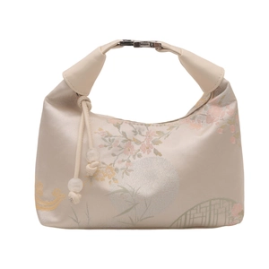 Oriental floral embroidery bucket bag in cream silk with bamboo patterns and metal handle