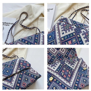 Fashionable geometric woven chain handbag with colorful texture and gold hardware detail