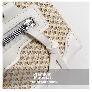 Détail du tissage en paille avec bordure en cuir blanc et fermeture éclair métallique