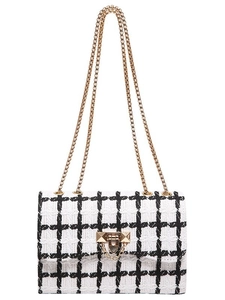 Classic black and white tweed chain shoulder bag with gold hardware and turn-lock