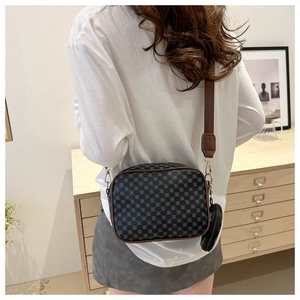 Detail of retro crossbody bag with geometric pattern and detachable mini coin purse