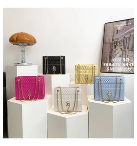Collection of five colorful quilted chain handbags with gold metal logos and fashion lettering