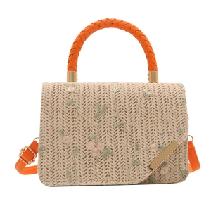 Sac bandoulière en paille avec broderie florale rose et poignées orange vif