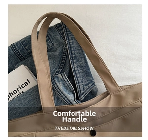 Close-up of durable canvas tote bag handle with neat stitching and buckle detail