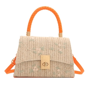 Sac bandoulière en paille avec broderie florale et poignée tressée orange