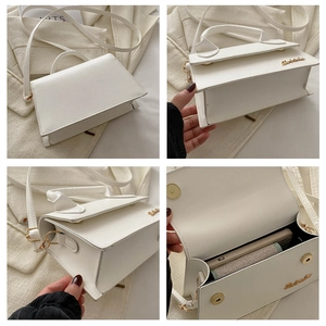 Detail view of white crossbody bag showing interior capacity and magnetic flap closure