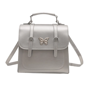Fashionable metallic silver backpack with butterfly buckle and versatile straps