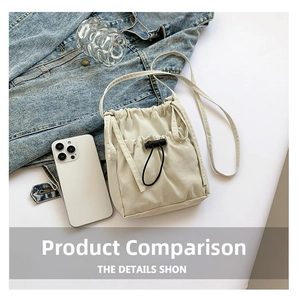 Close-up of beige nylon drawstring bag with adjustable buckle and shoulder strap