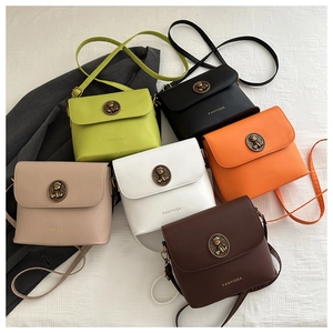 Detail showing vintage style bucket bags in six colors with decorative bronze metal buckle