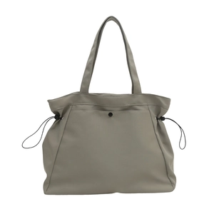 Minimalist light grey large capacity tote bag with drawstring side details and shoulder straps