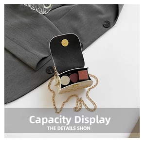 Internal view of mini crossbody bag showing storage capacity for lipstick and makeup