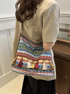Bohemian knitted tote bag with colorful wave patterns and fringe tassels for women