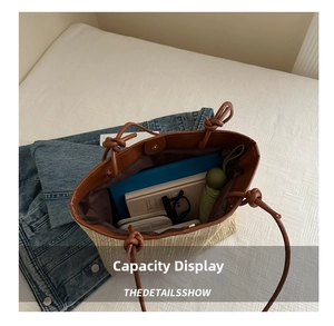 Detail view of woven straw tote bag interior showing spacious storage for daily essentials