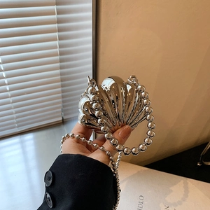 Elegant silver metallic shell mini chain bag with glossy finish for women's fashion